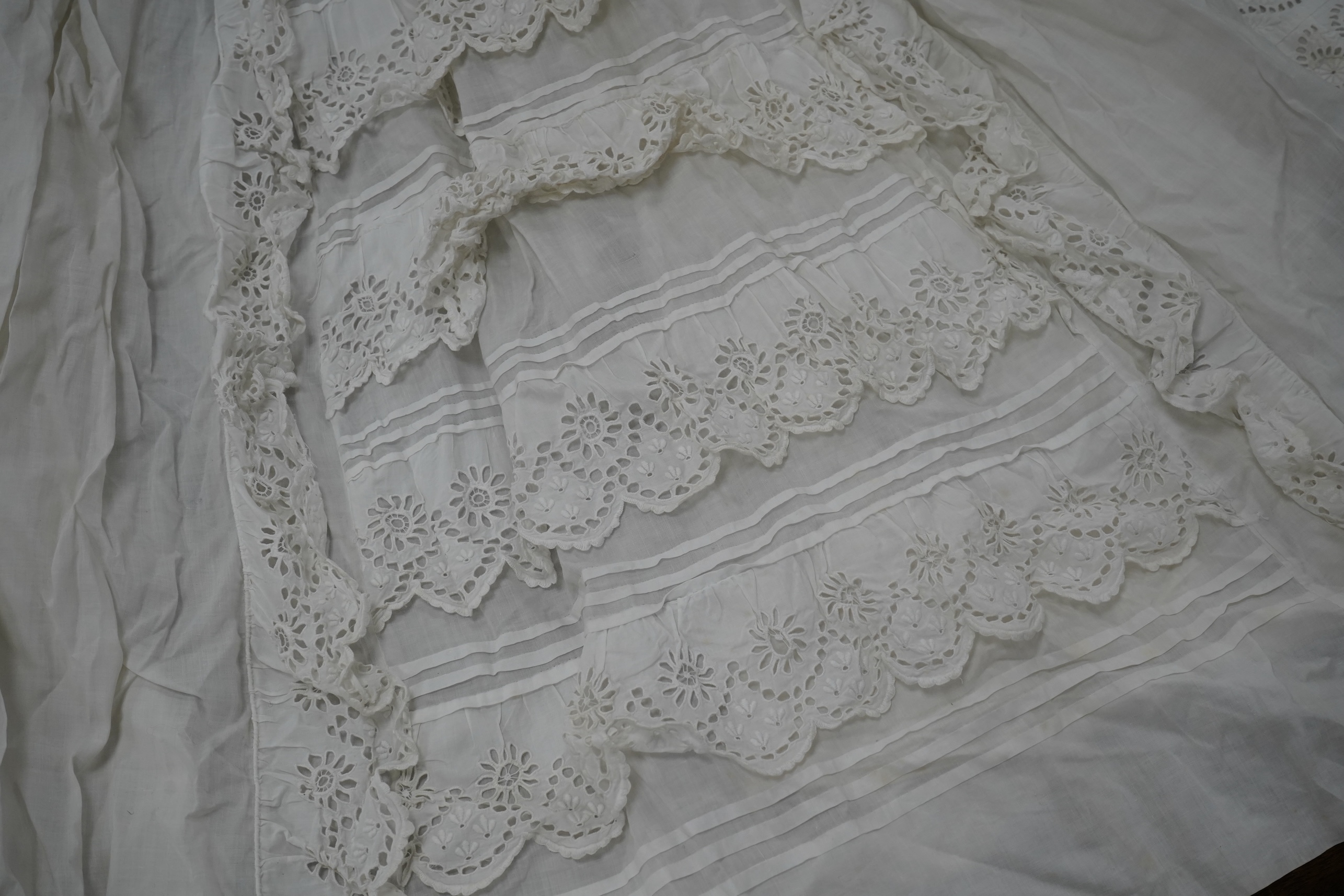 Five Victorian white worked fine cotton and lawn baby’s christening gowns. mostly worked with embroidery anglaise, feather stitching, tucking, drawn thread work and lace edging, longest 41cm. Condition - in good conditio